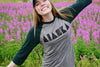 Alaska raglan t-shirt in a field of fireweed